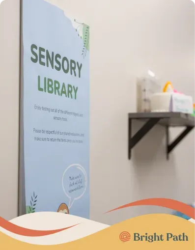 “Sensory Library” sign on a wall at Bright Path